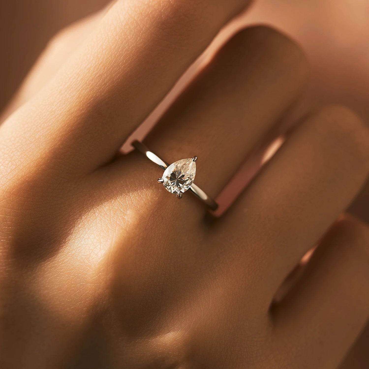 Close view of moissanite ring highlighting ring size from ring details