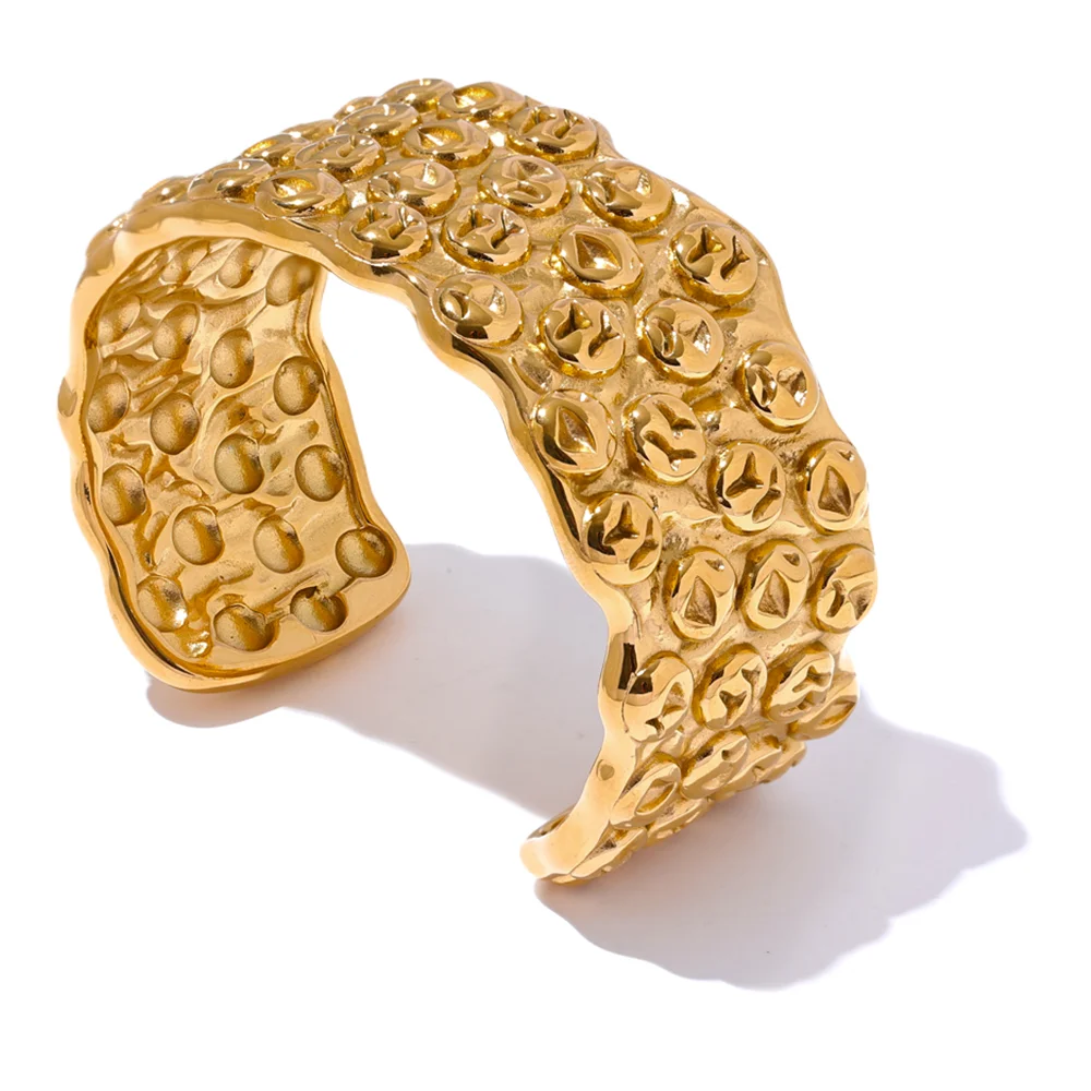 Stainless steel jewelry metal bracelet shown as a cuff bracelet in gold plated