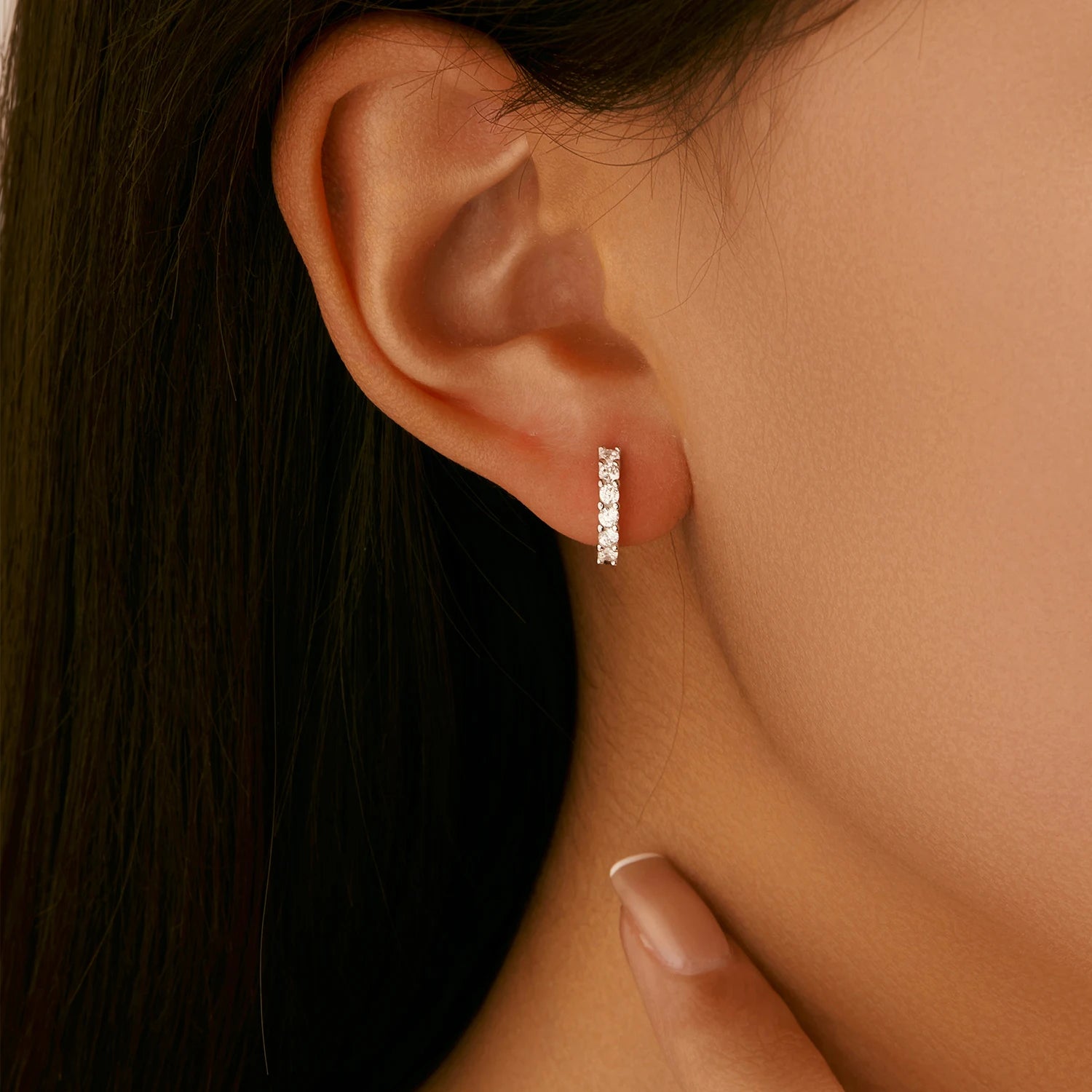 Sterling silver hoop earrings shown as silver hoops for daily wear