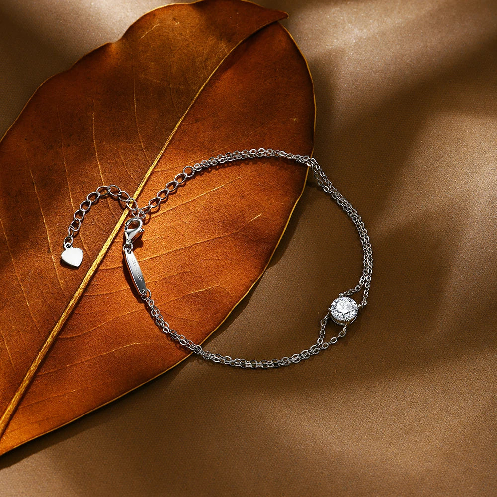 Silver bracelet for women featuring round moissanite stones