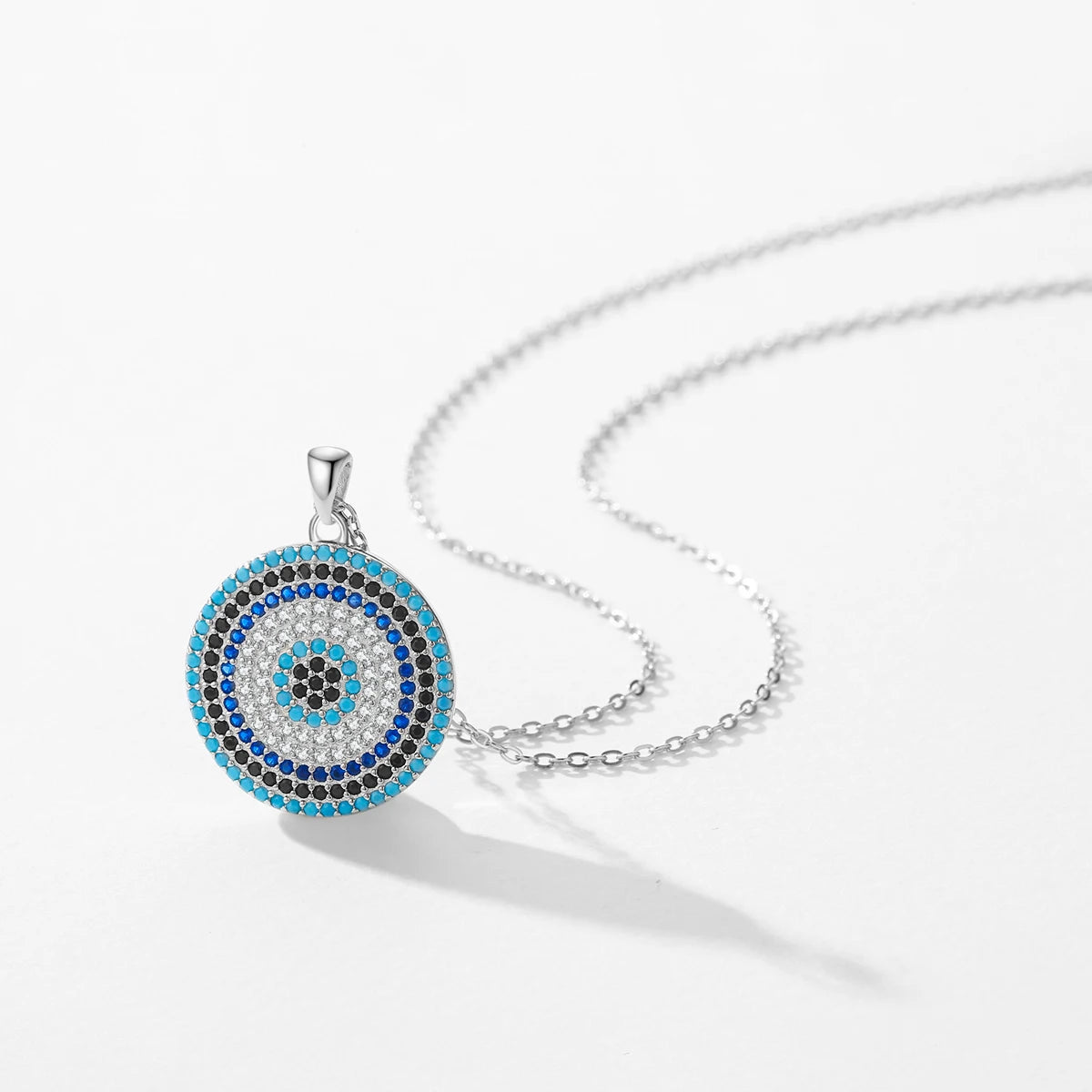 Silver necklace with pendant necklace gold accent and turquoise center