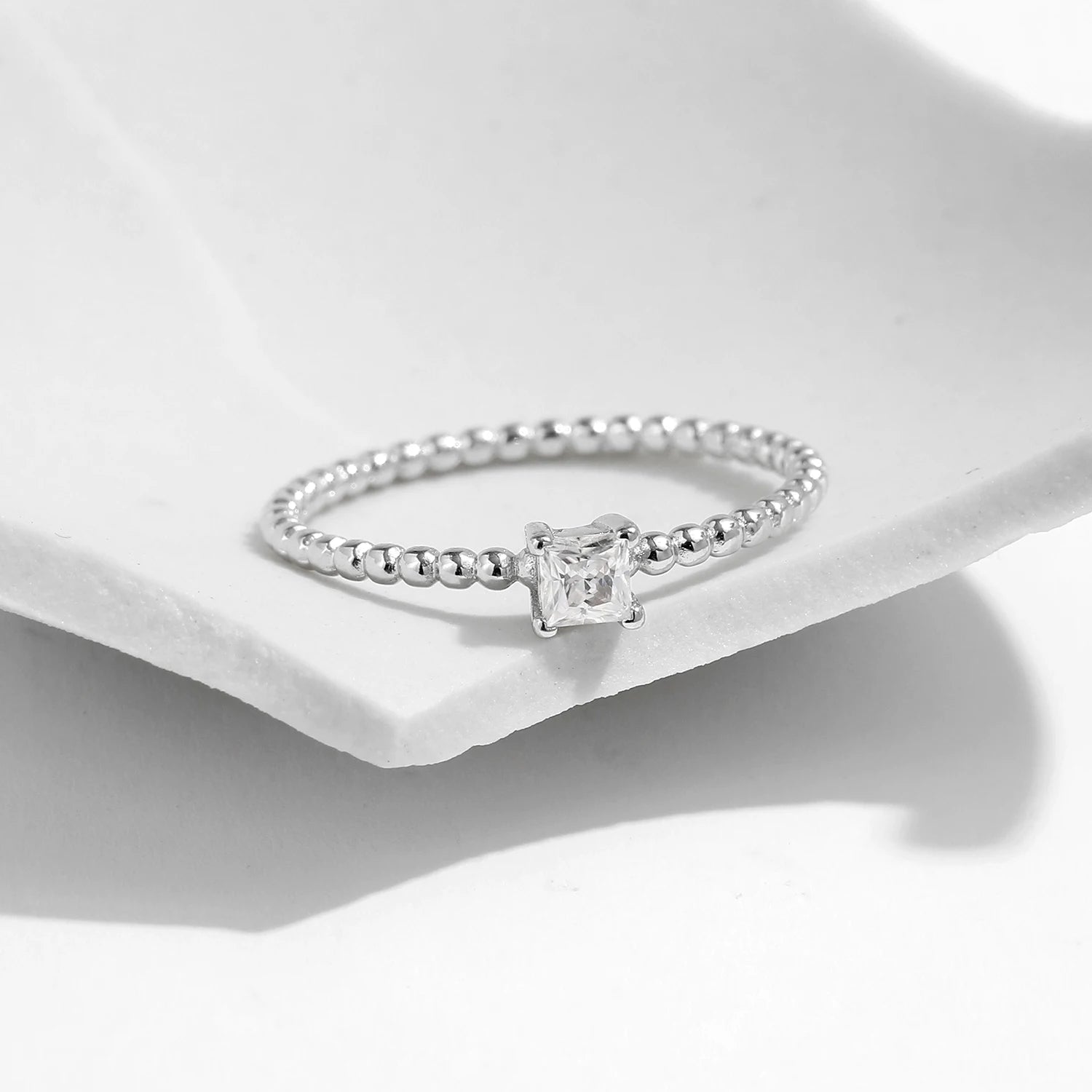 Wedding ring style highlighting rings with moissanite brilliance