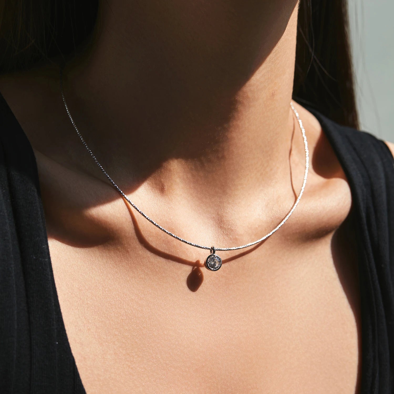 Sterling silver necklace with cz centerpiece and smooth snake chain fall