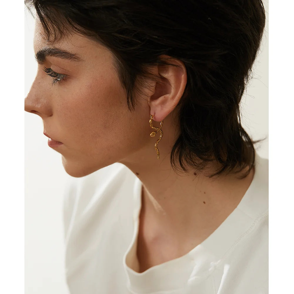 Gold hoop earrings for women in bold statement earrings style