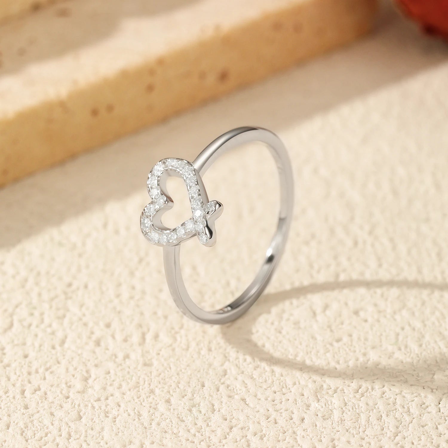 Elegant sterling silver ring size band with hollow heart design