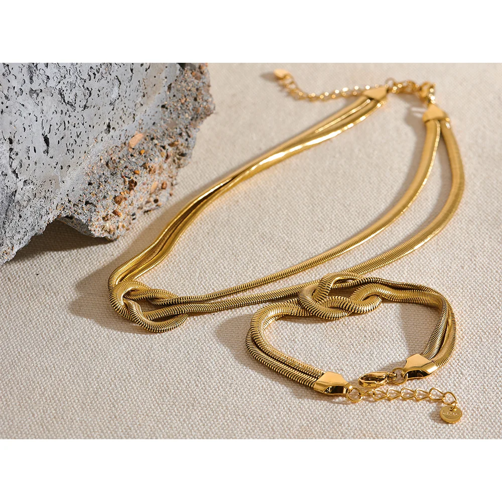 Gold jewelry chain necklace styled for layered looks