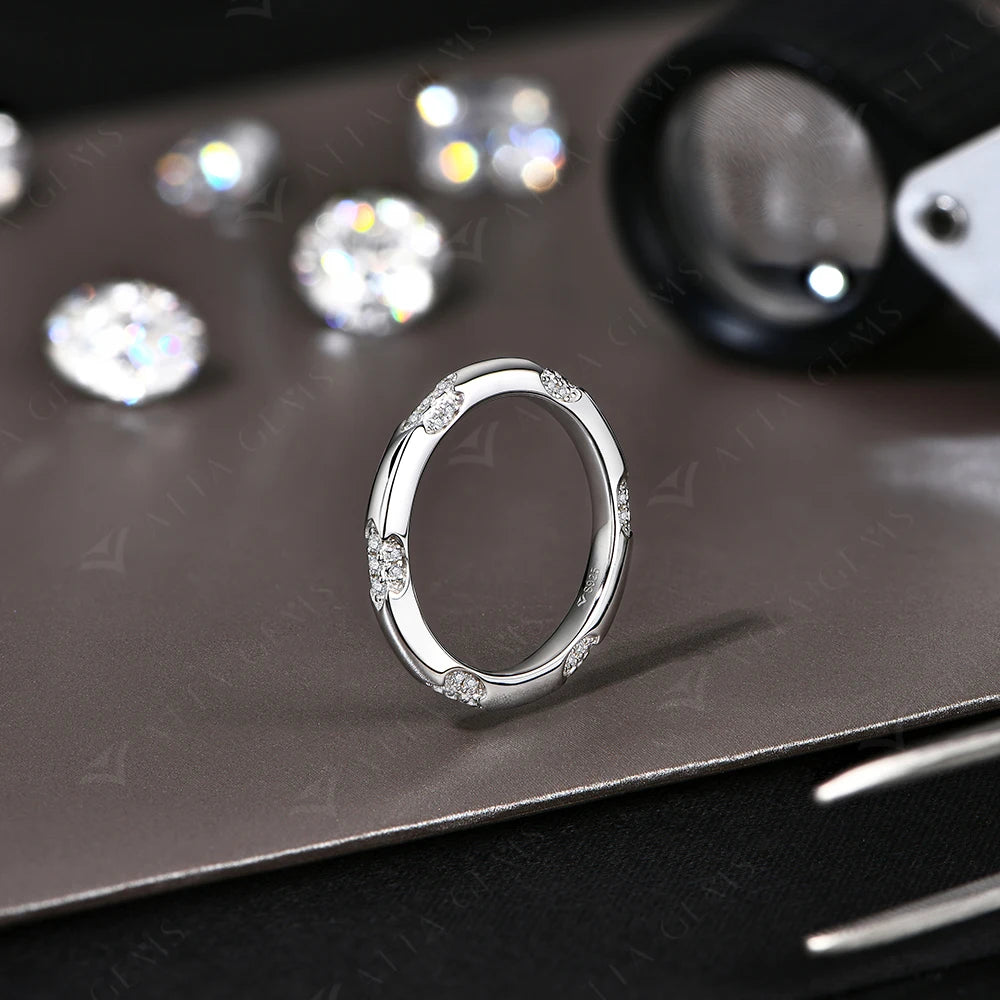 Close view of moissanite rings in a wedding band rings style