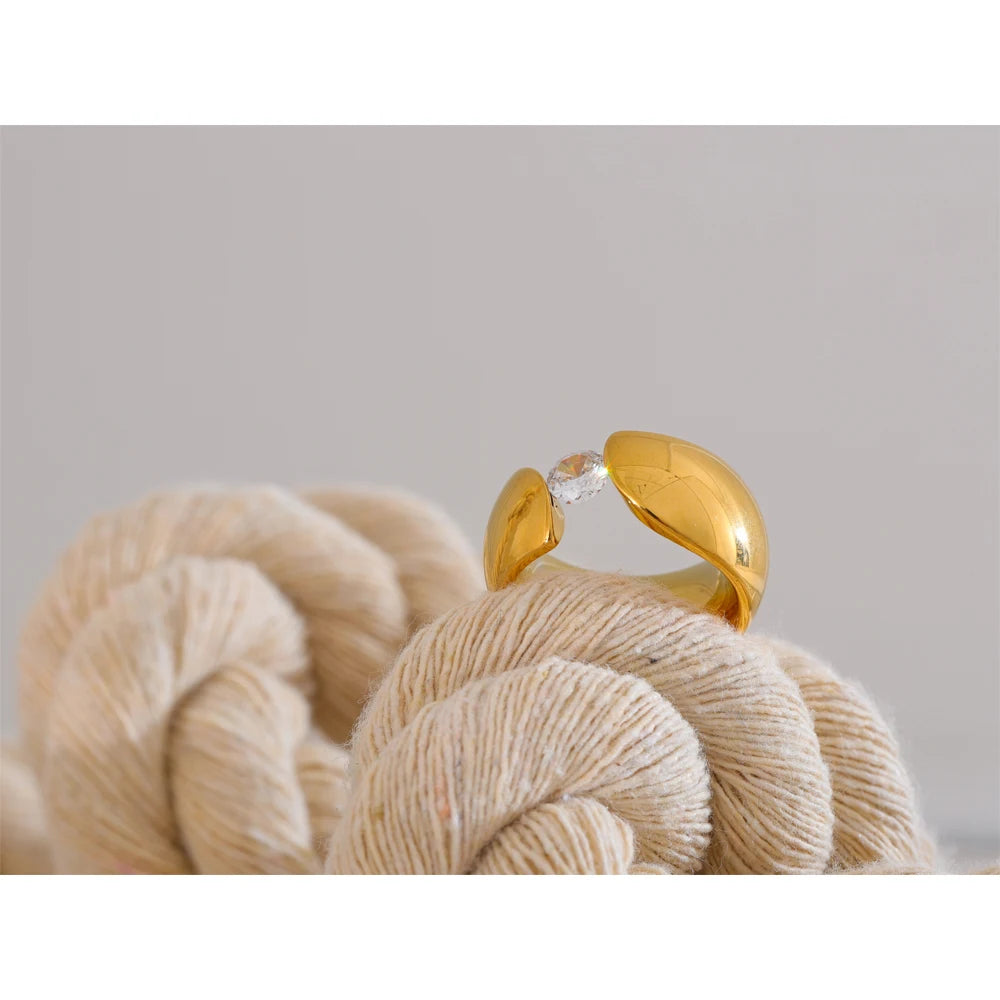 Elegant gold jewelry ring featuring cubic zirconia sparkle