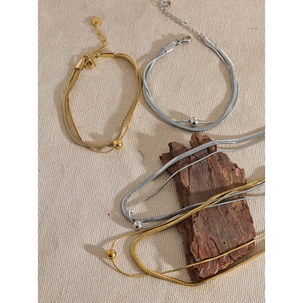 Layered gold chain look with a polished bracelet chain