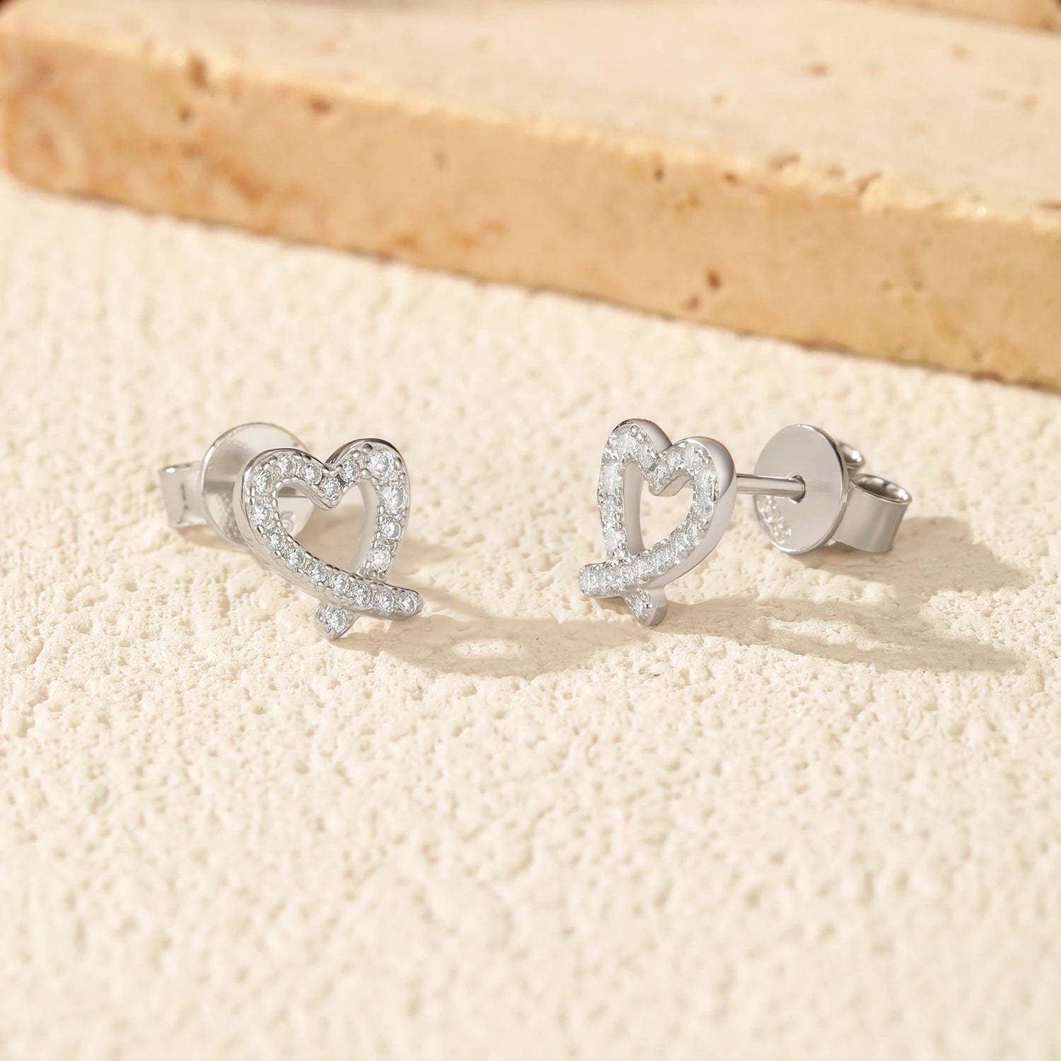 Sterling silver earrings with bright moissanite diamond shine