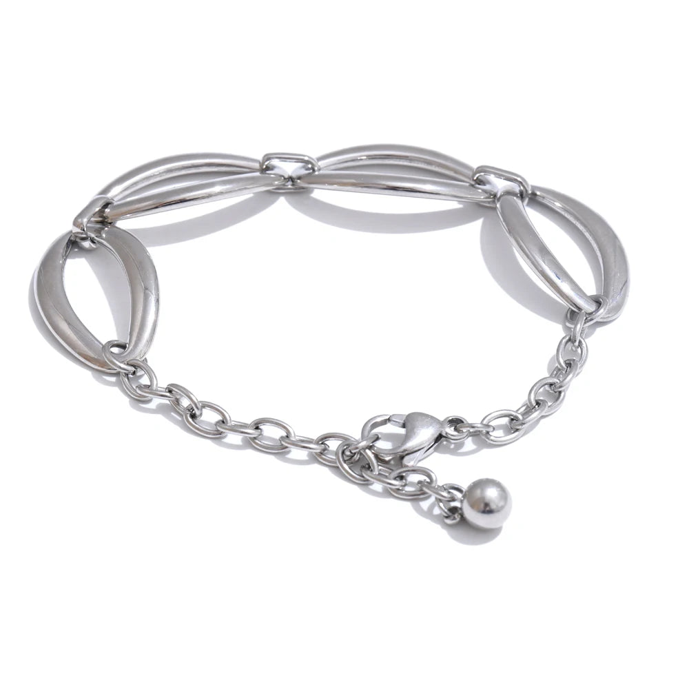 Geometric gold necklace bracelet set on display