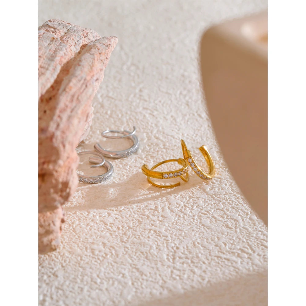 Classic hoop earrings in a gold plated finish with subtle sparkle