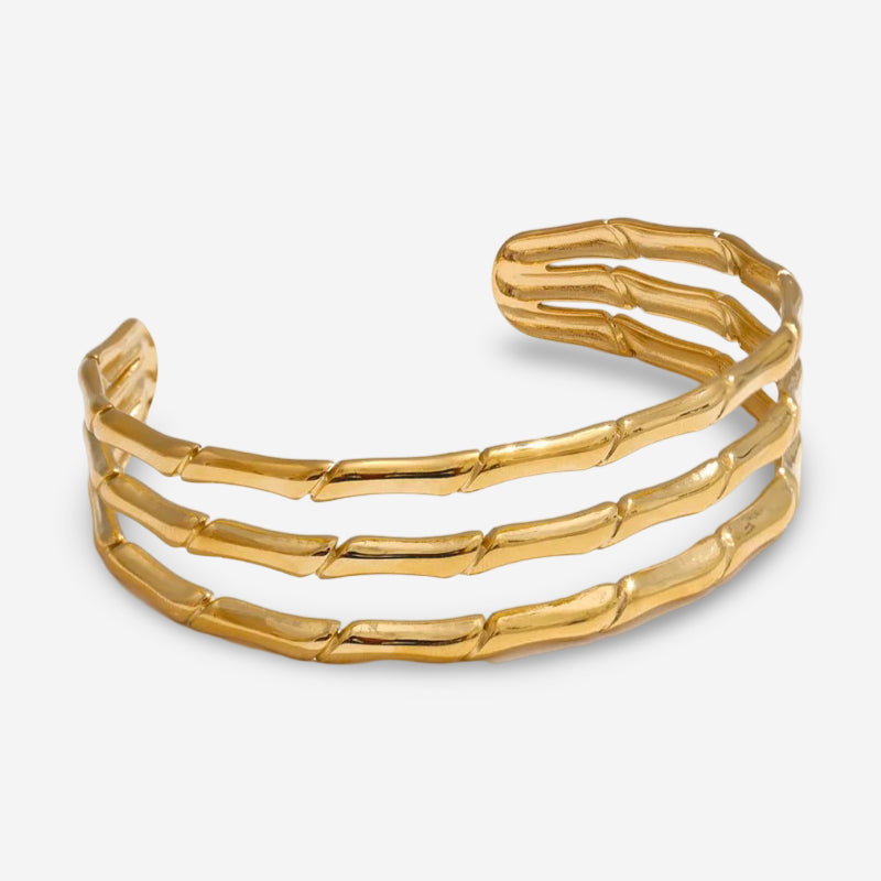 Elegant gold cuff bracelet with layered hollow style
