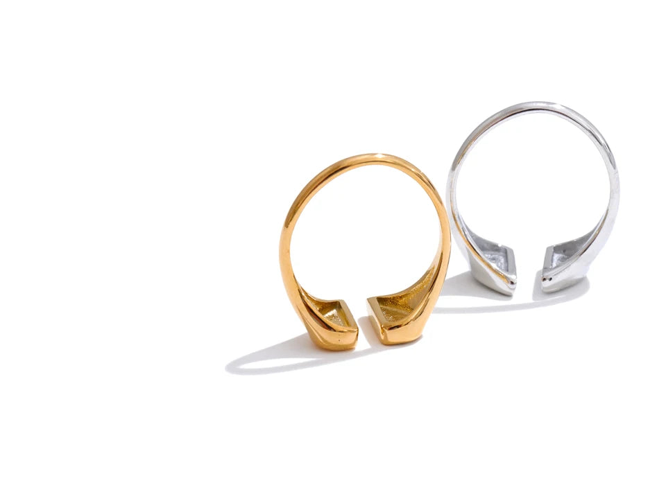 Romance inspired ring in a finger with cubic zirconia sparkle and gold plated shine