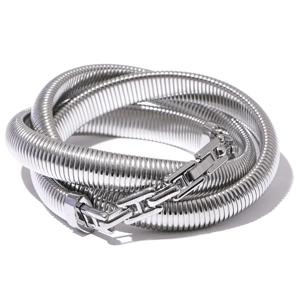 Minimal a gold bracelet set arranged with gold gold bracelet