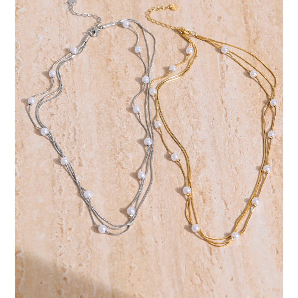 stainless steel gold necklace with square links and round pearls layered style