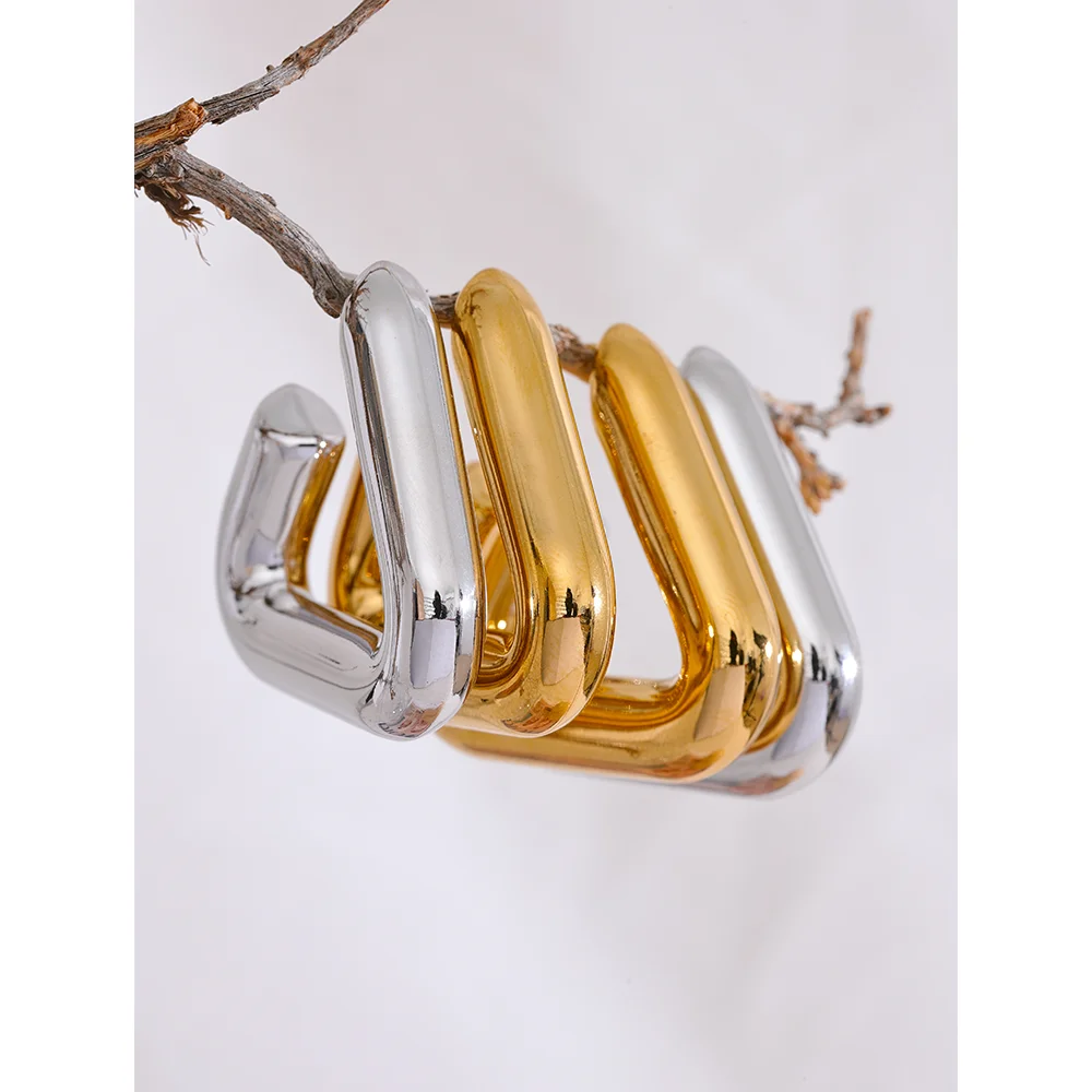 Women’s statement triangle hoops stainless steel metal texture