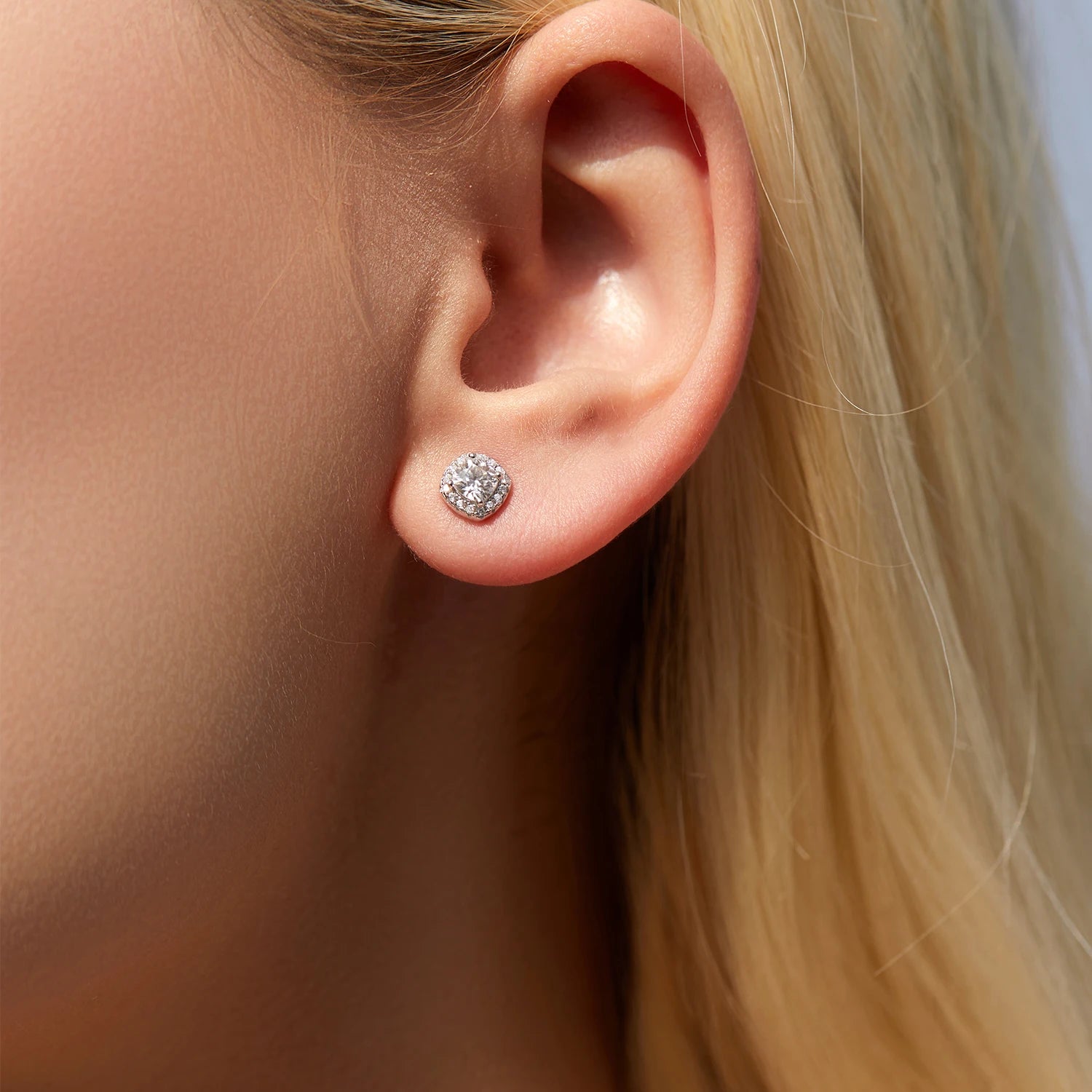 Heart earrings look paired with classic moissanite earrings