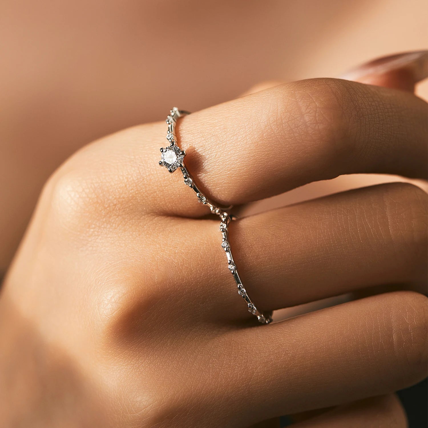 D-Color moissanite eternity wedding band in sterling silver