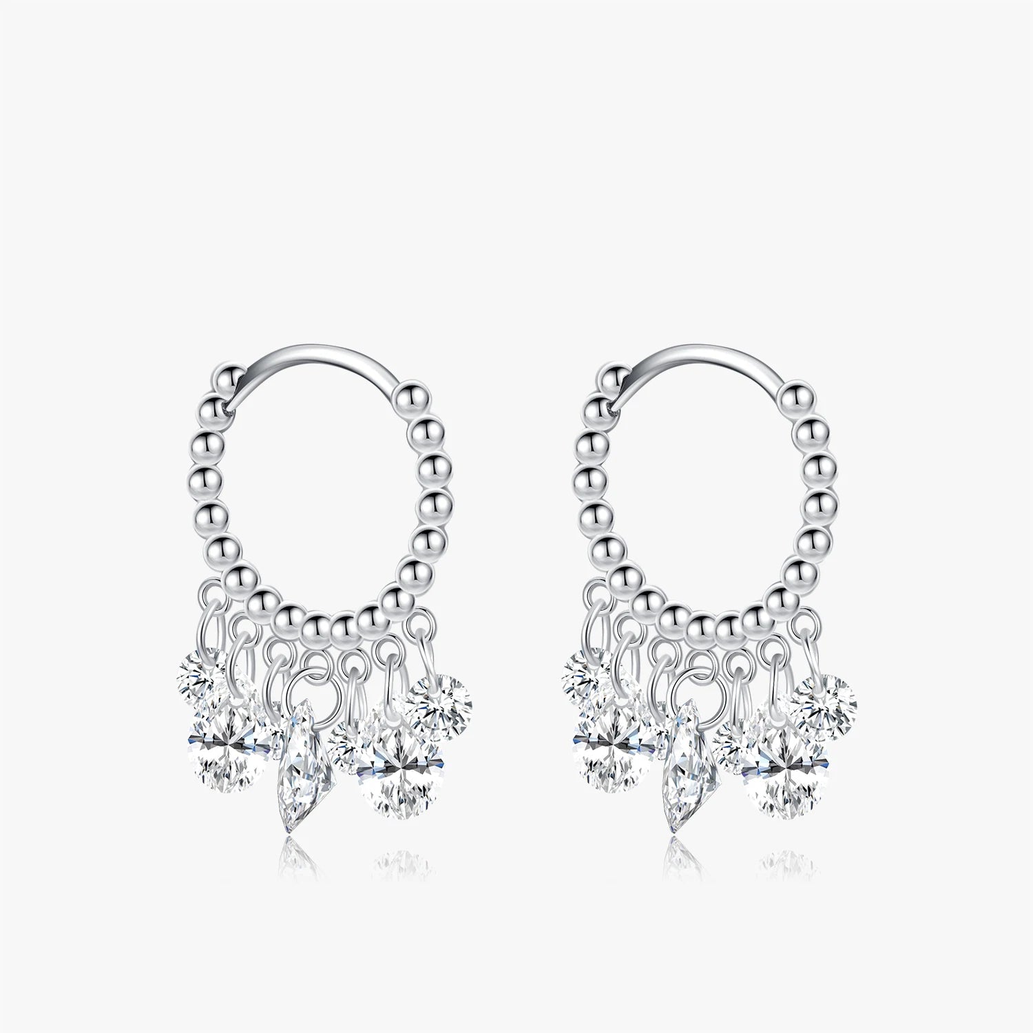 Elegant ear rings with clear zircon clusters in geometric hoop silhouette