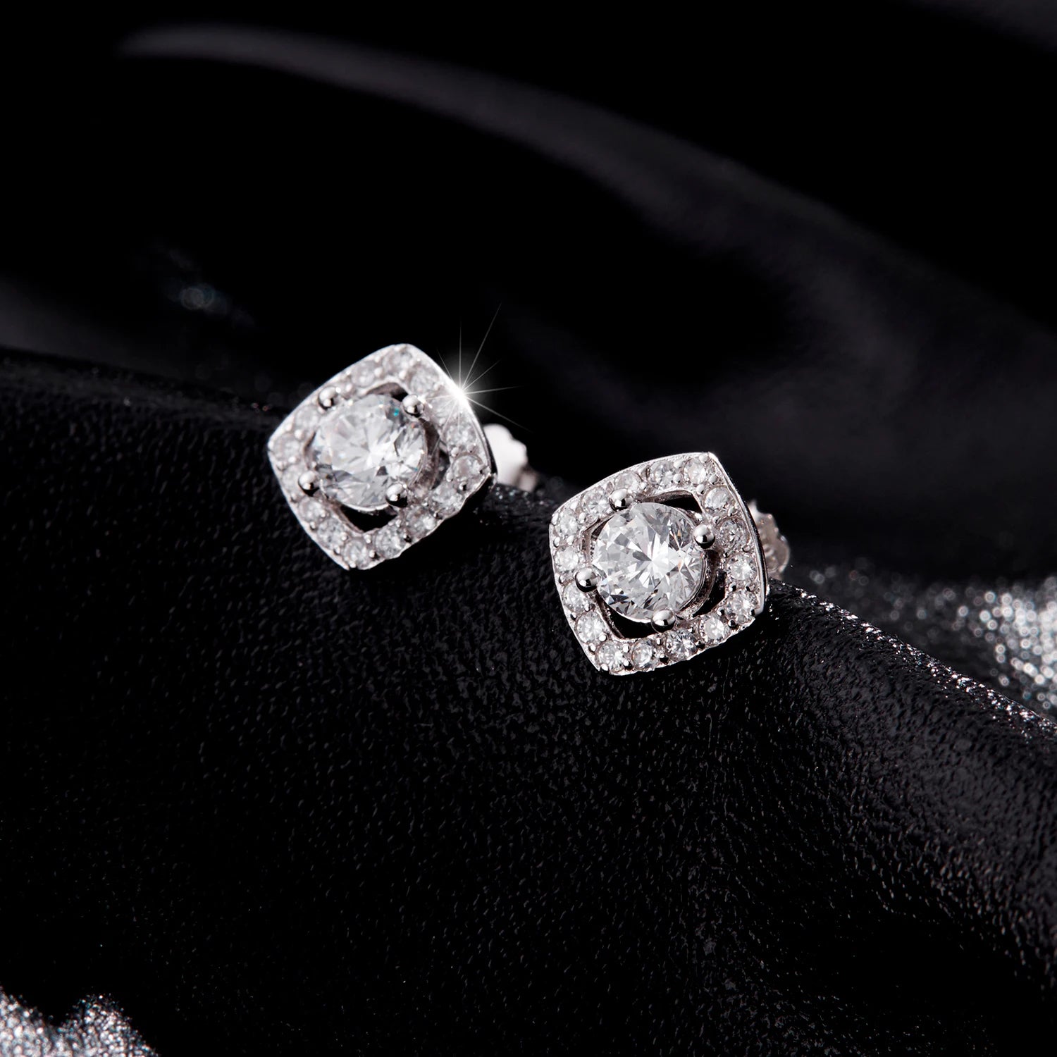 Sterling silver studs featured in polished 925 silver with strong CZ reflections
