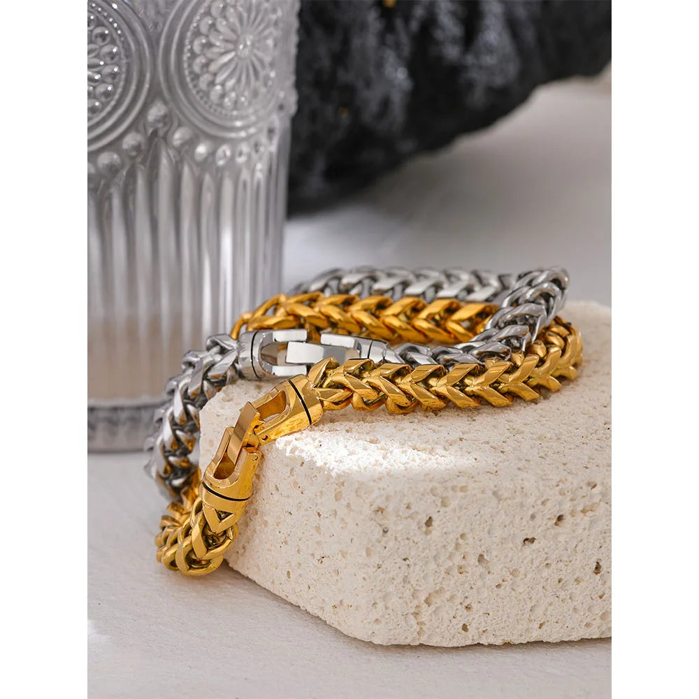 Chain and bracelet pairing featuring a gold cuban chain accent