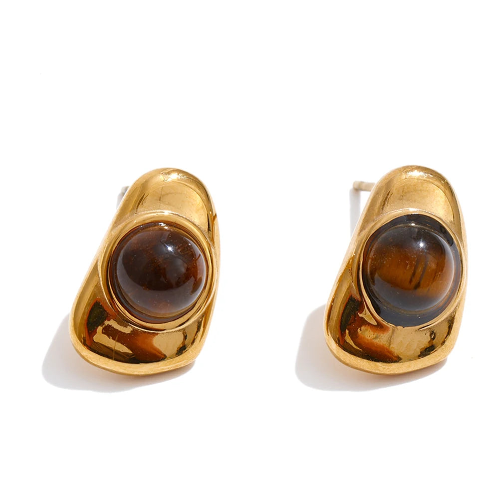 Editorial shot of pendant focus with pearl on a necklace and gold plated sheen