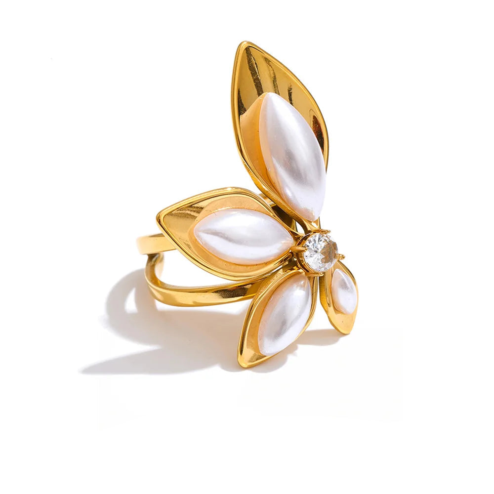 Pearl ring with gold finish paired with matching earrings