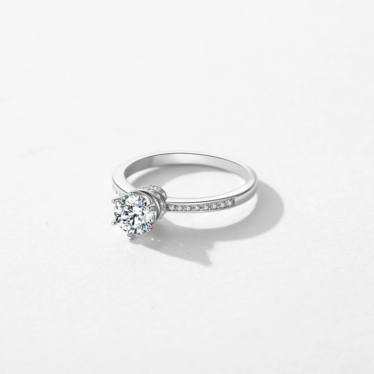 Elegant women engagement ring with subtle crown jewelry accent