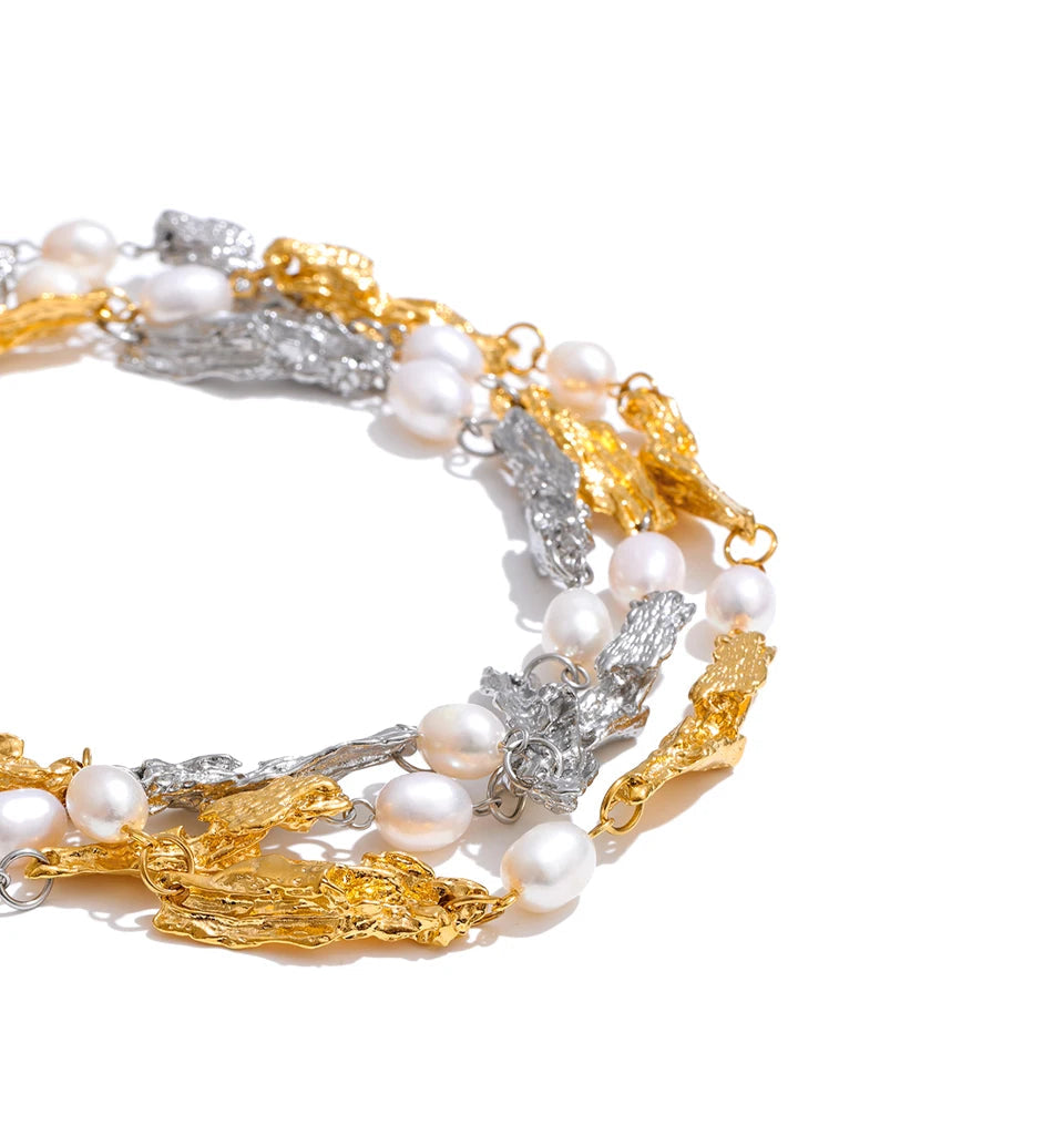 Natural pearls paired with gold plated lava design necklace