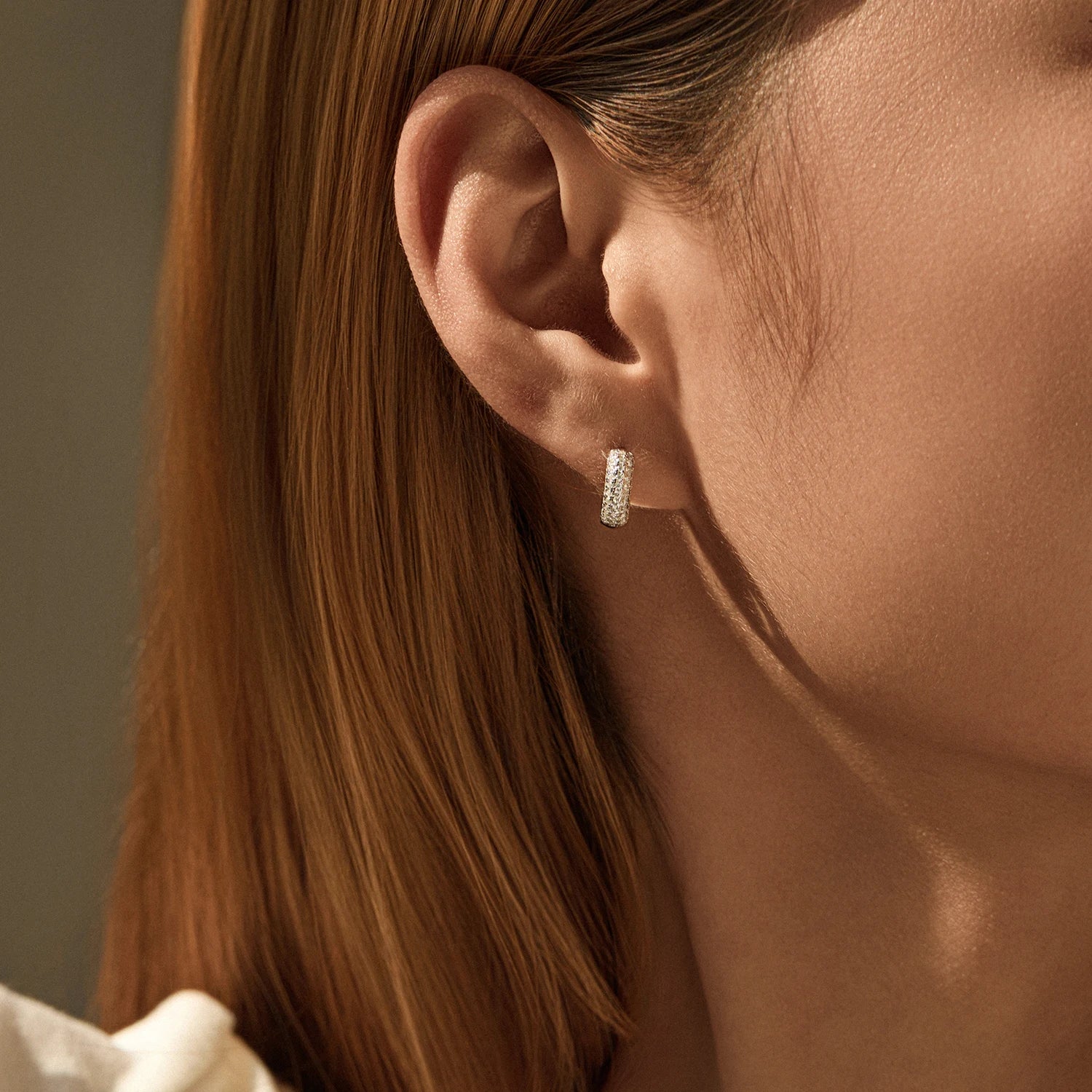 Sparkling sterling silver hoop earrings with moissanite diamond