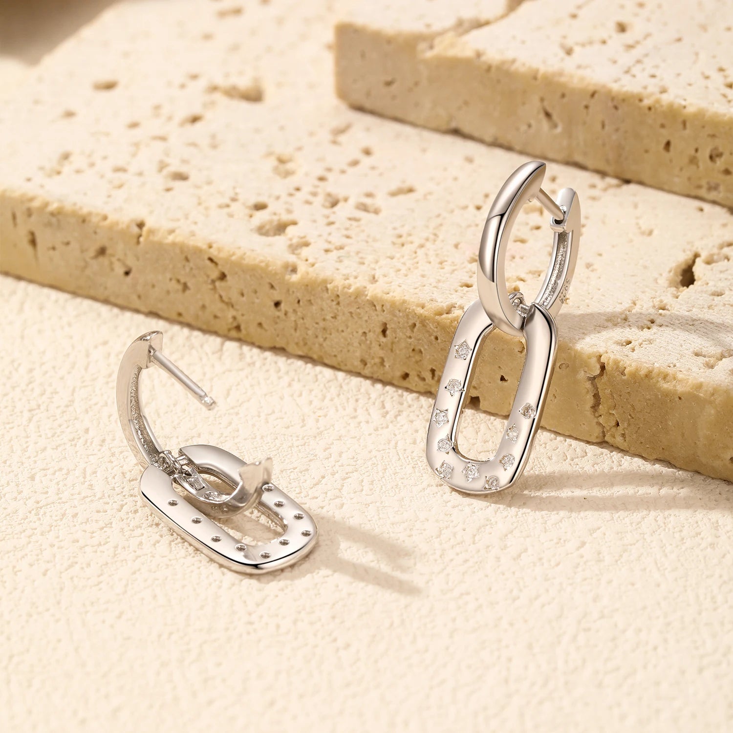 Silver hoops featuring star earrings sparkle for women