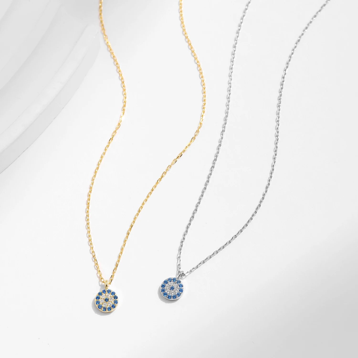 Silver necklace showcasing an elegant evil eye design