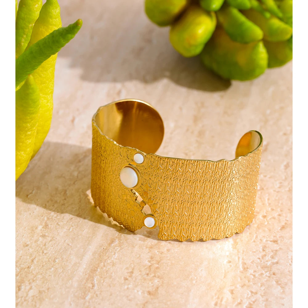 Gold plated bangle bracelet showing polished edges and smooth fit