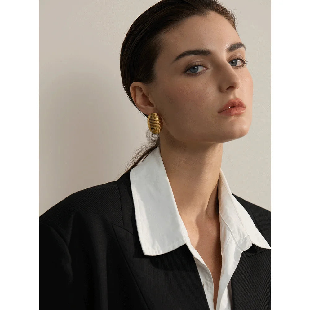 Stud ear rings with a soft gold plated sheen