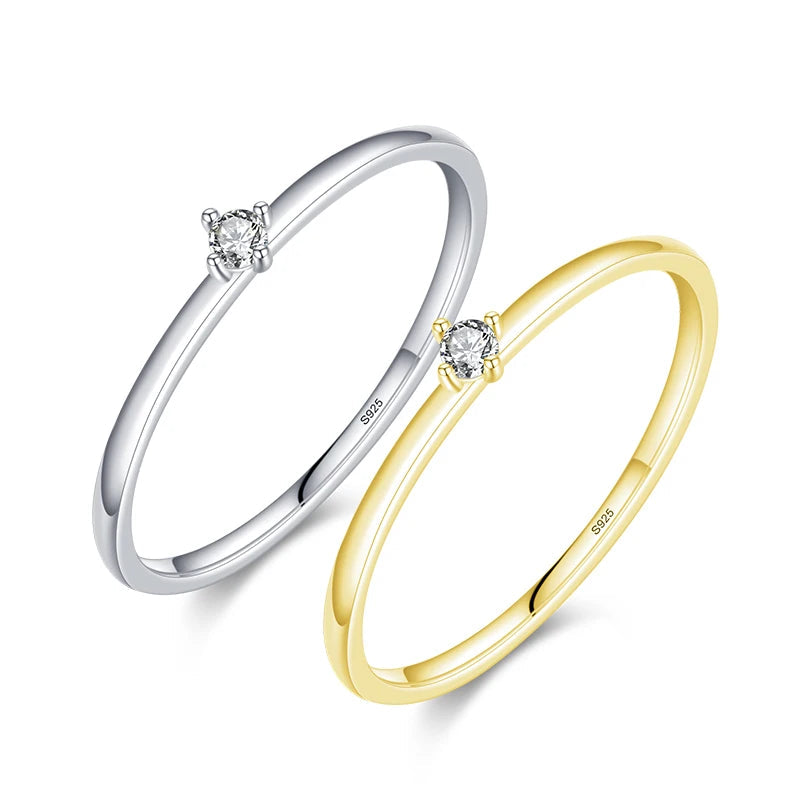 D Color round moissanite ring in sterling silver styled as a wedding ring