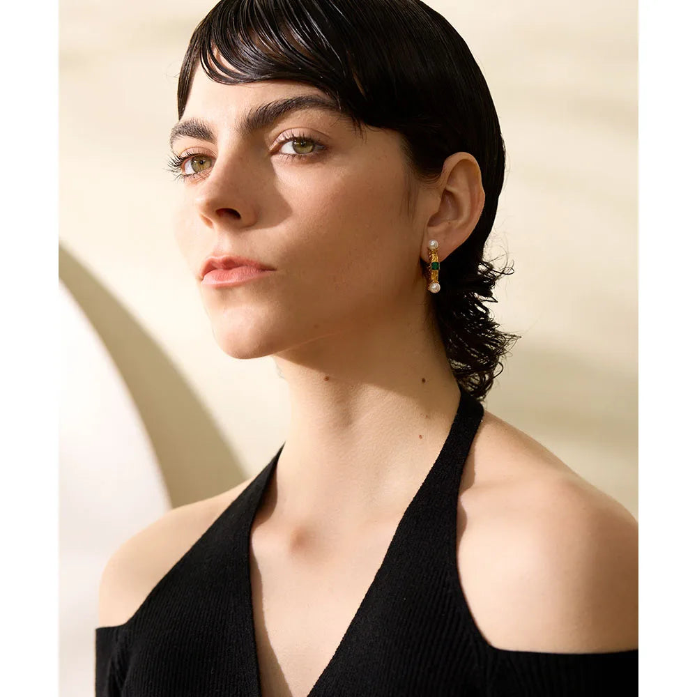 Ear rings in hoop earrings style featuring cubic zirconia and earrings pearl detail