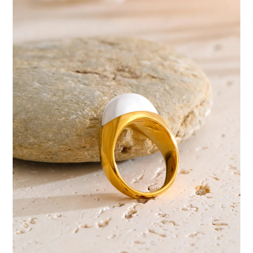 Simulated pearls fashion jewelry ring styled with golden jewelry