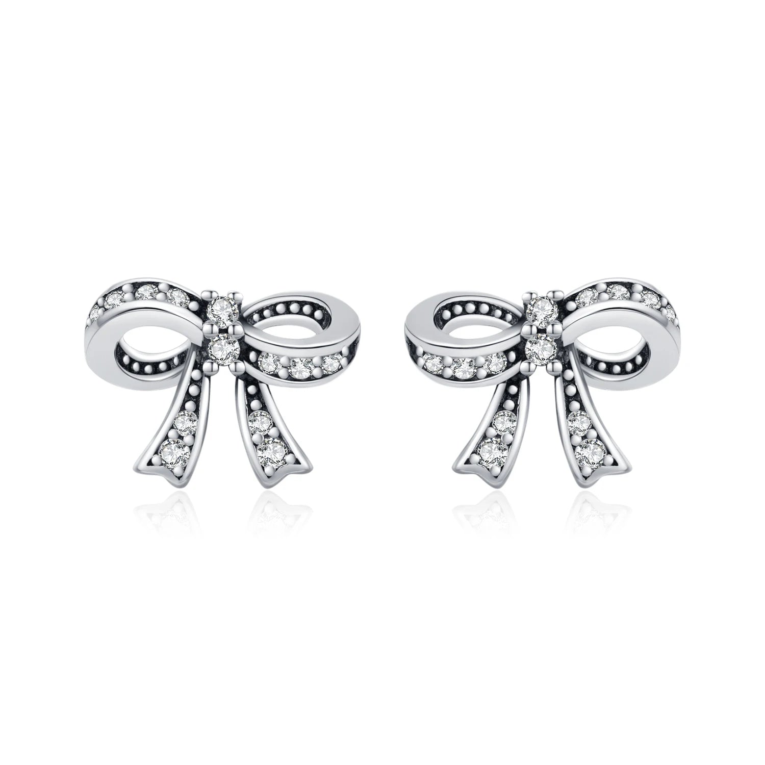 Model wearing vintage bowknot cz stud earrings with silver color shine