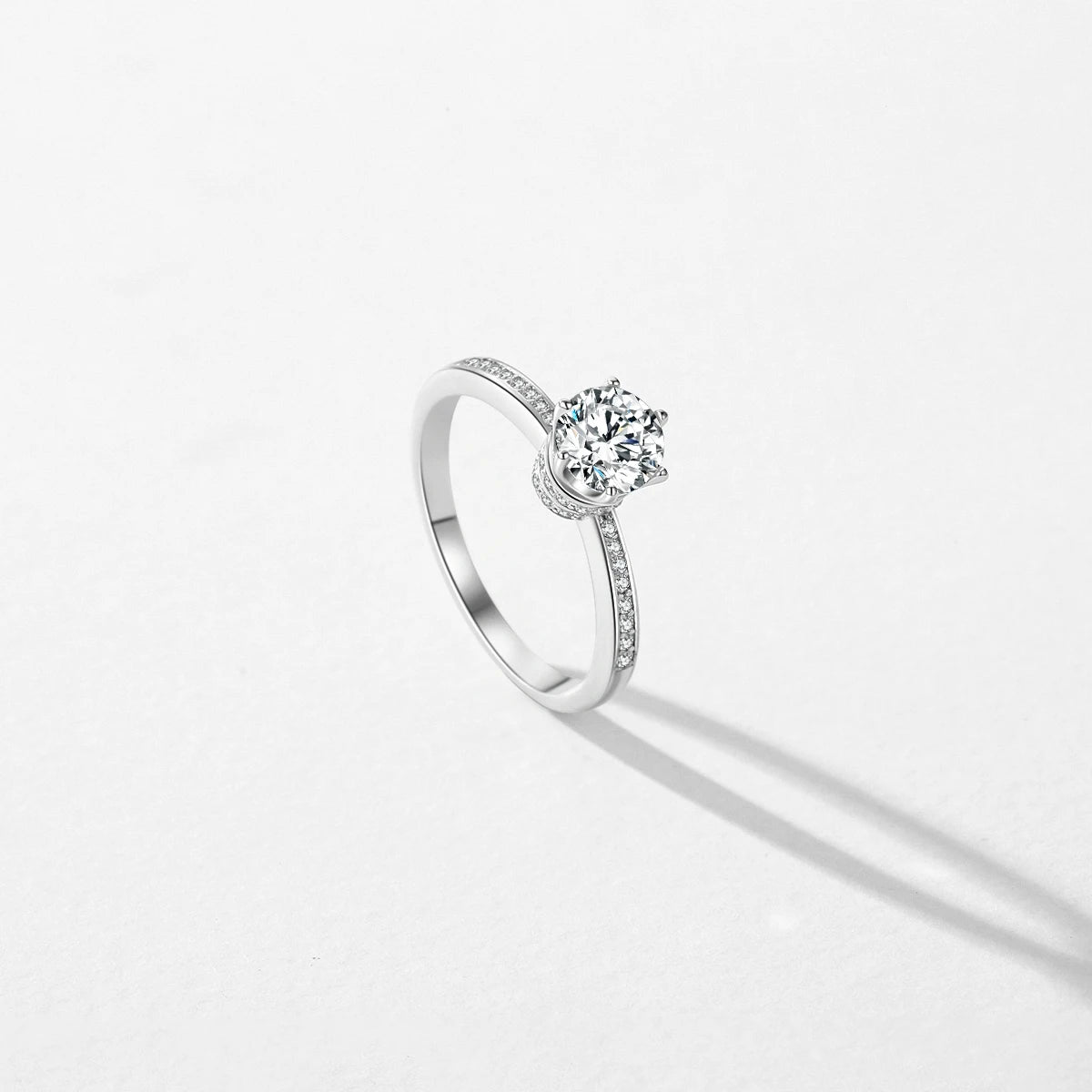 Close view of a sterling silver engagement ring with polished band
