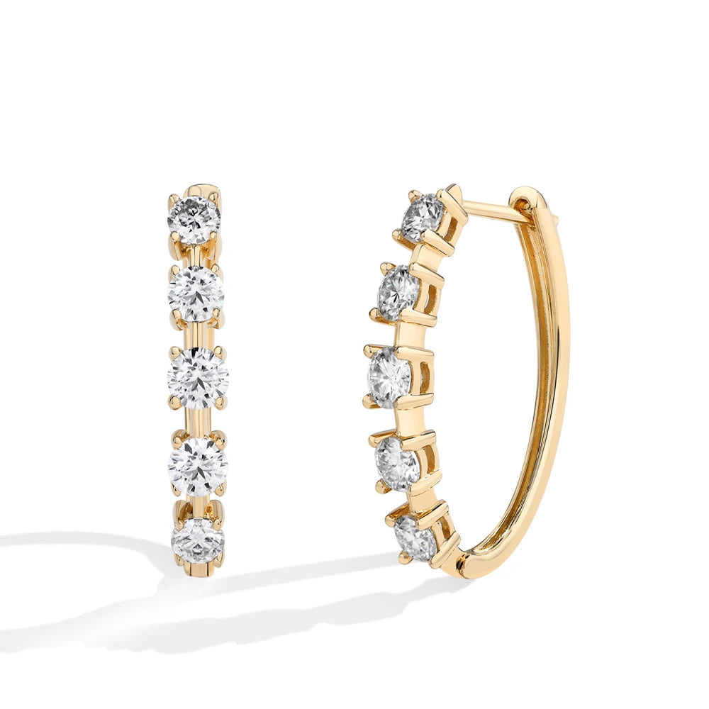 Earrings and gold combination shown in polished drop earrings