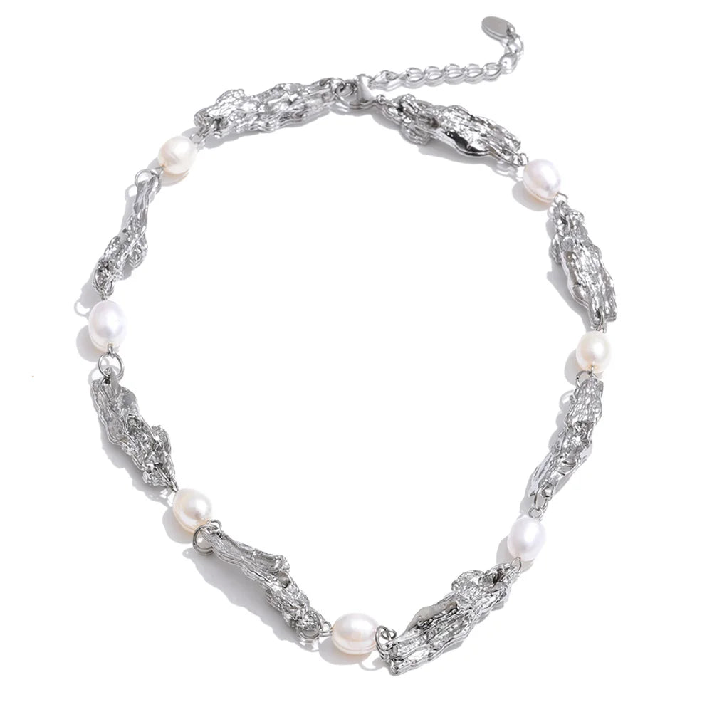 Stainless steel jewelry necklace with pearl accents