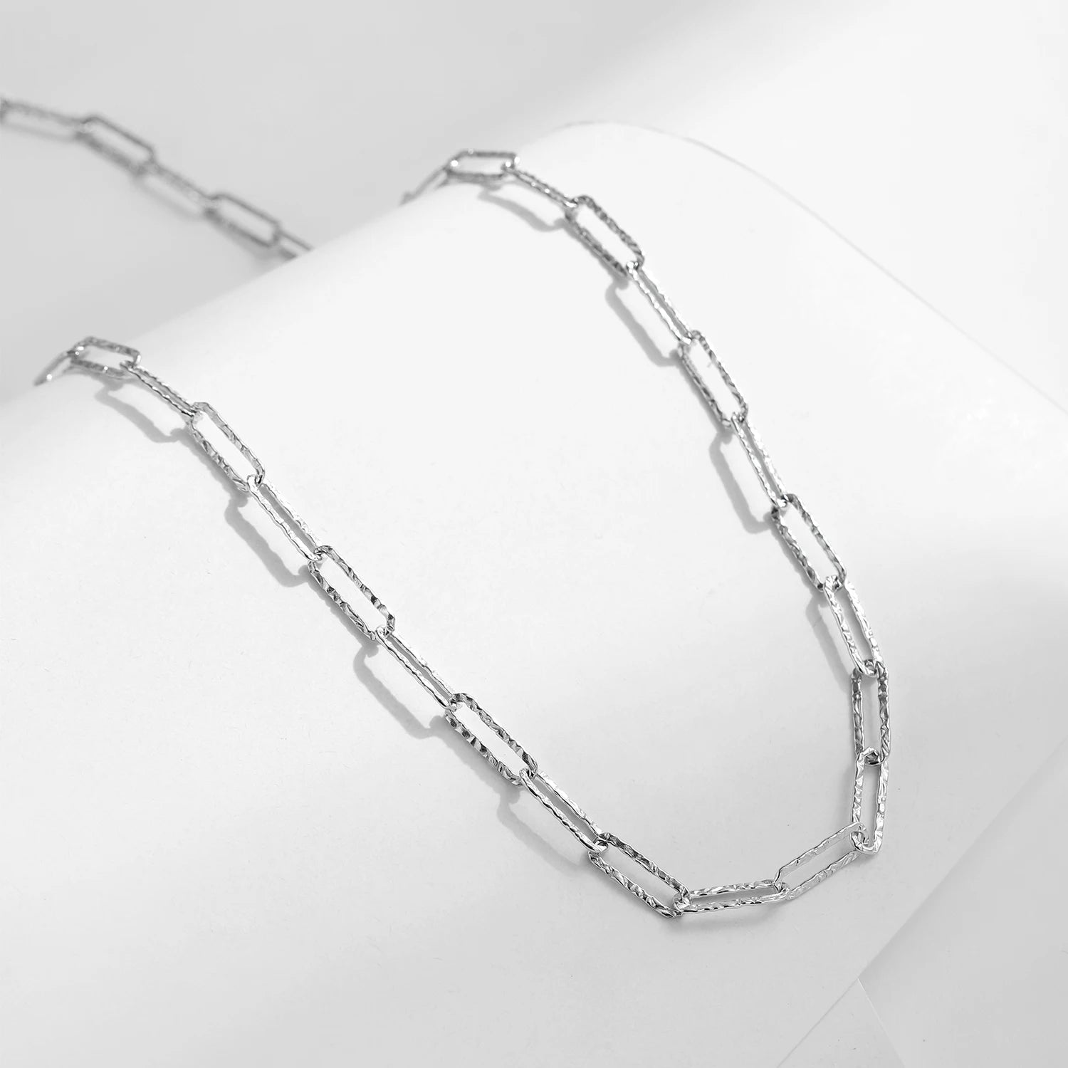 Sterling silver necklace showcasing a refined tinfoil texture
