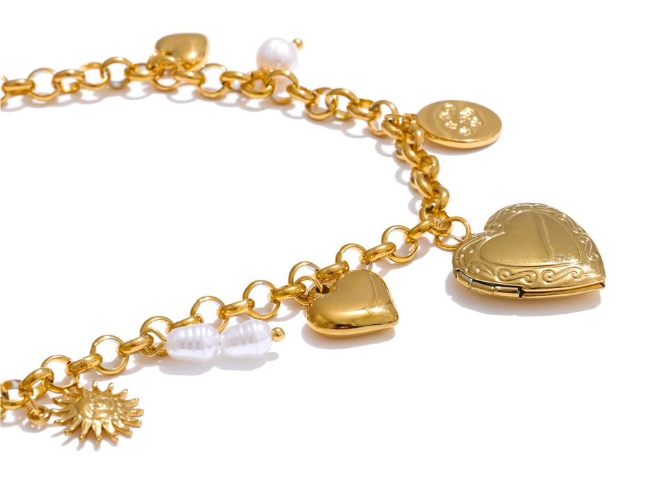 Elegant wrist shot stacking a gold bracelet with the pearl bracelet from the set