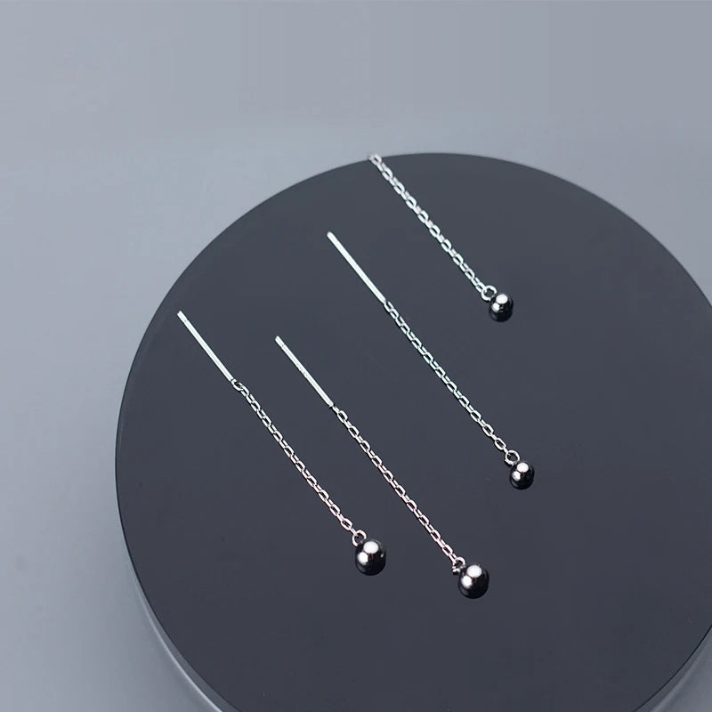 Sterling silver earrings with drop charm minimal style