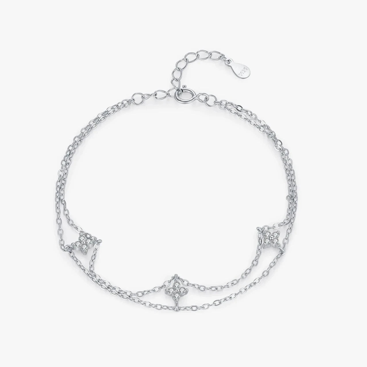 Clover bracelet detail shown in bright sterling silver