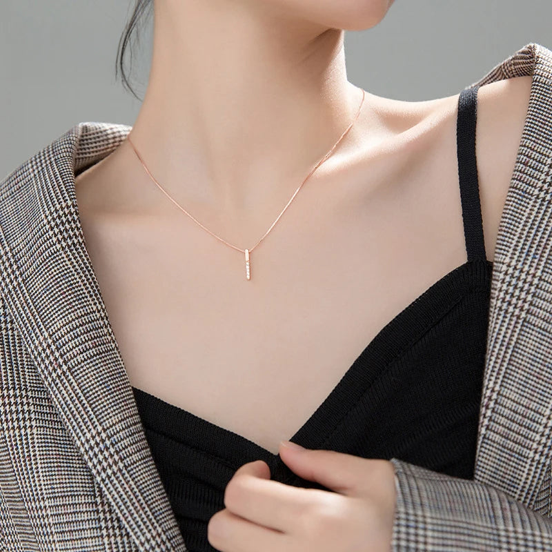 Minimal sterling silver pendant necklace styled for necklace and necklace layers