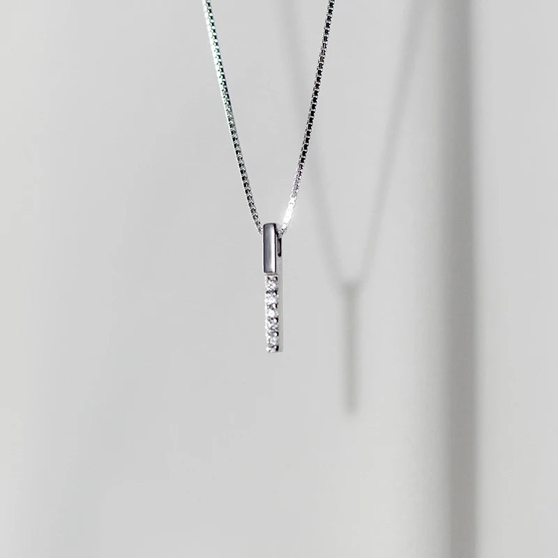 Modern chain necklace showing a zircon rectangle pendant in 925 sterling silver