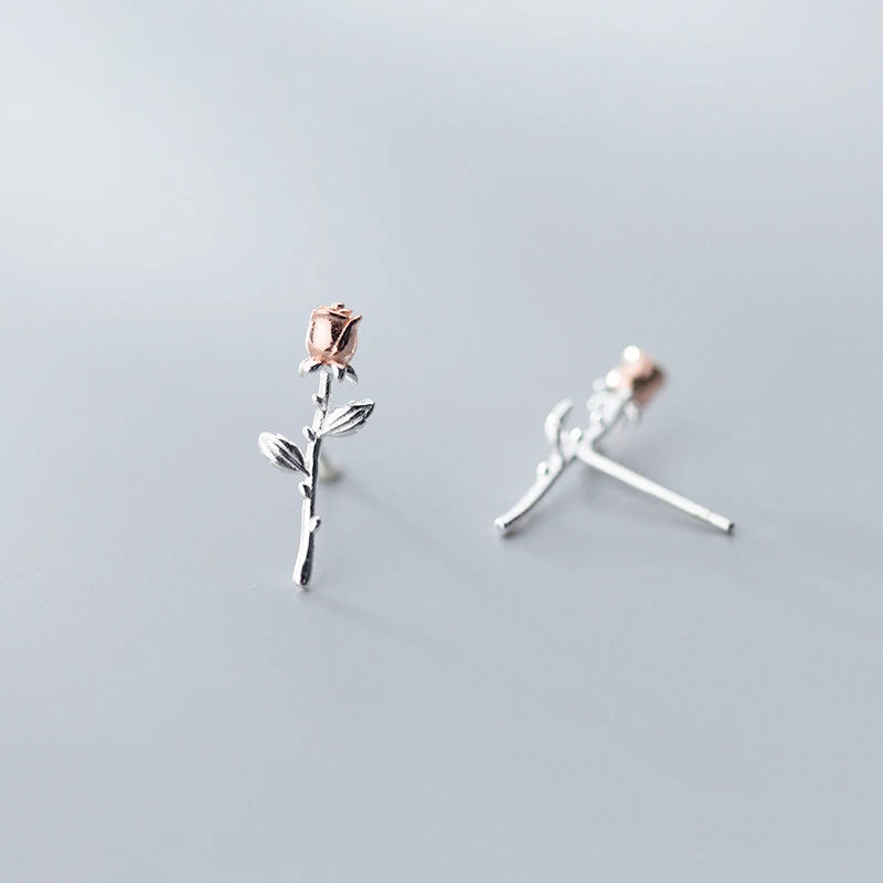 Rose gold flower earrings shown as stud earrings in 925 sterling silver