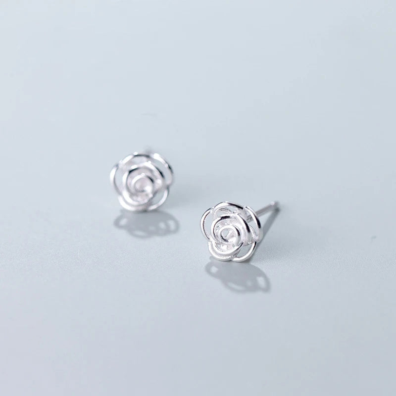 Delicate rose shaped hollow studs matching everyday elegance